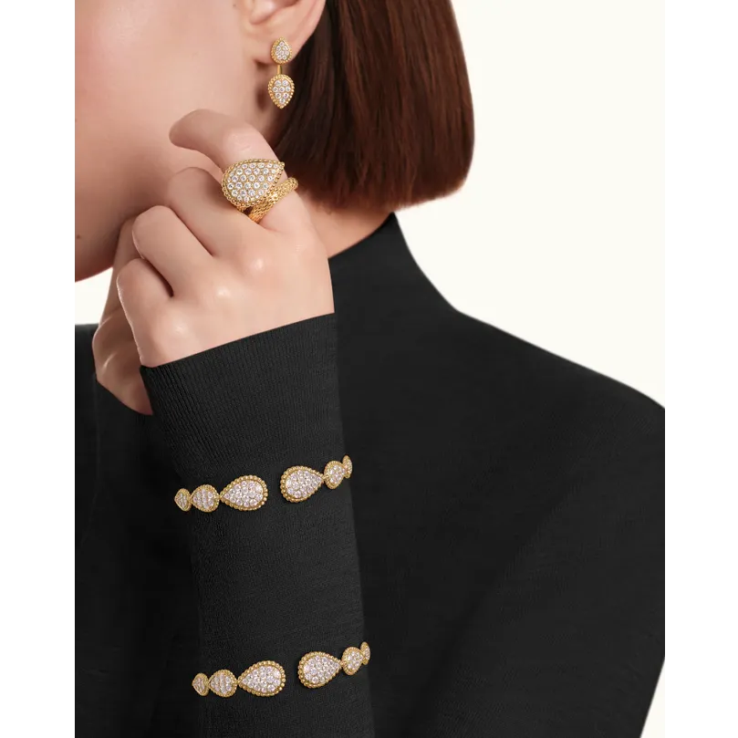 BOUCHERON ブシュロン セルパンボエム イエローゴールド 2モチーフ シングル スタッズイヤリング JCO01425